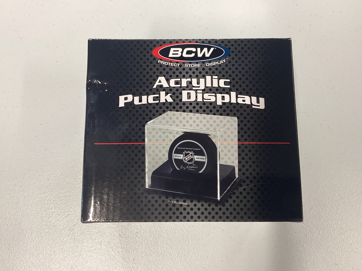 Acrylic puck display