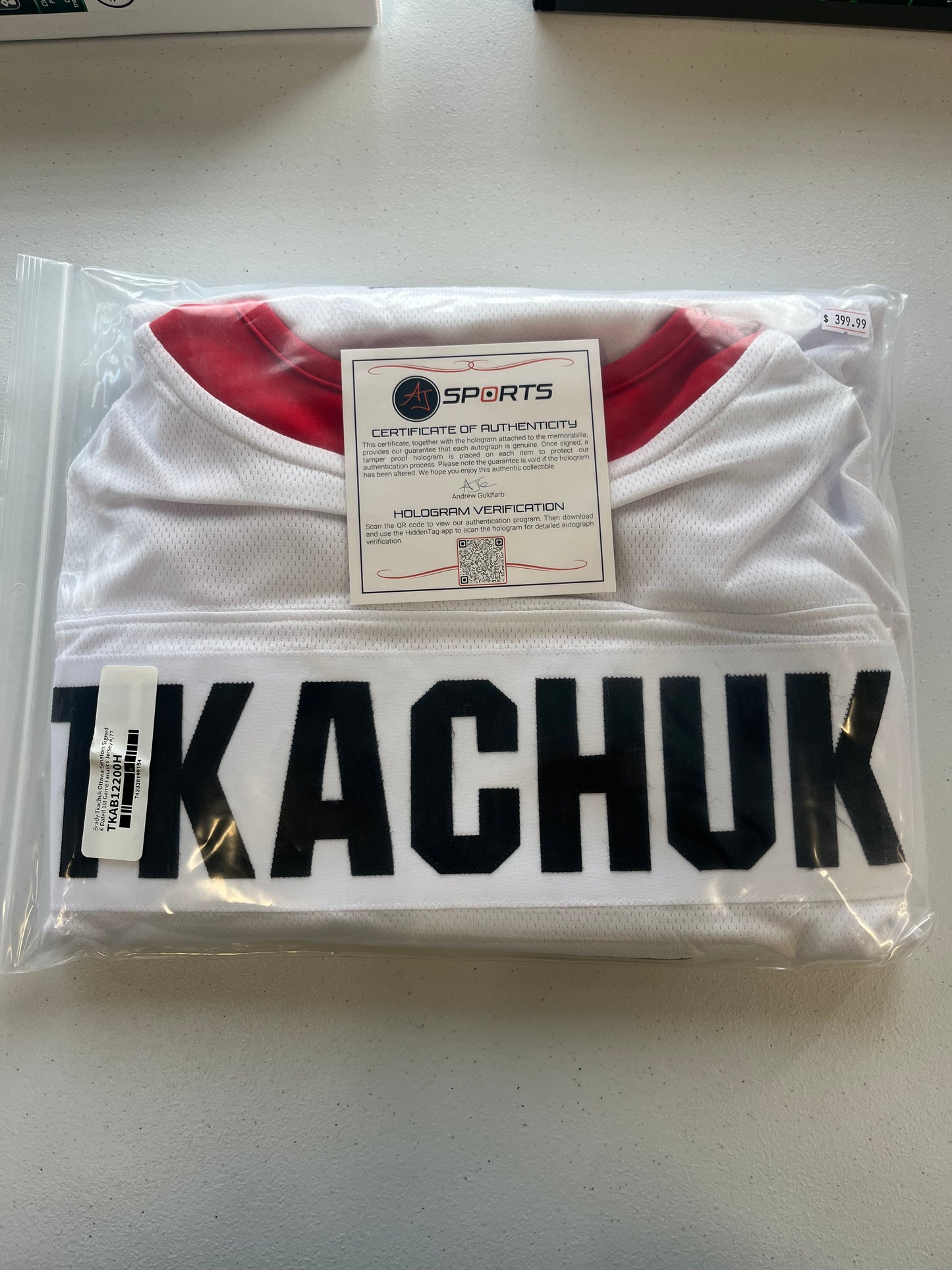 Brady Tkachuk 1st Game /77 Auto Jersey AJ COA